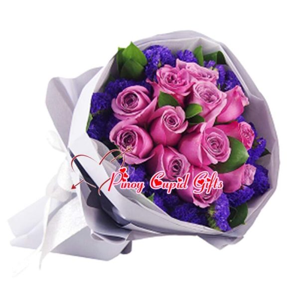 10 Imported Purple Roses in a bouquet arrangement