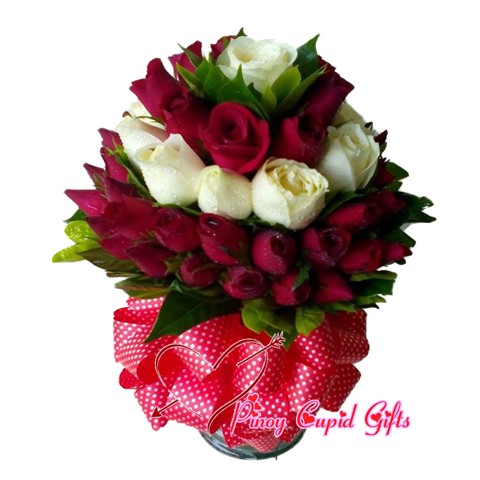 20 Imported Red and  10 Imported White roses in a vase.