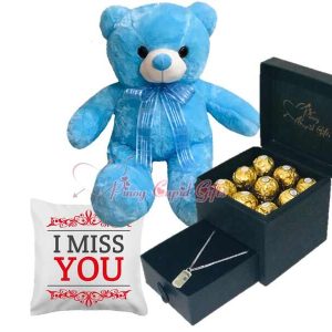 romantic box with dog-tag necklace and ferrero plu bear and pillow