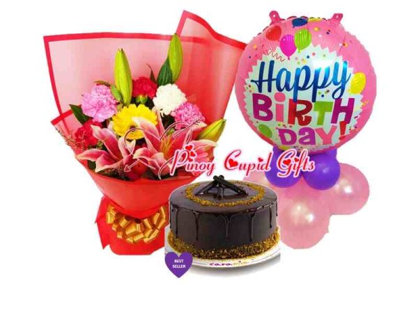 Mixed flowers, caramia cake and birthday balloons