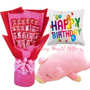 KitKat bouquet, stuffed toy, and birthday pillow