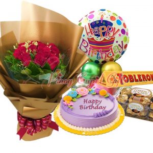 roses, pastel blooms ube cake round, toblerone and ferrero choco, plus birthday balloons