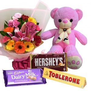 Mixed Flower Bouquet, 2 FT Pink Teddy Bear, 1 Bar Cadbury Dairy Milk (200g), 1 Hershey's Bar 200g Toblerone chocolate