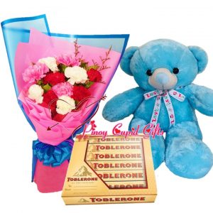 mixed carnations , teddy bear and toblerone chocolate