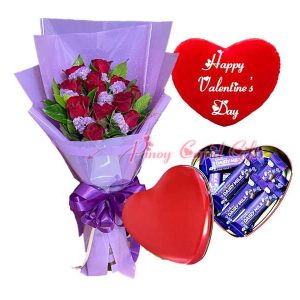 1 dozen red roses, Mini Cadbury Chocolates in Heart box, & Valentines Pillow