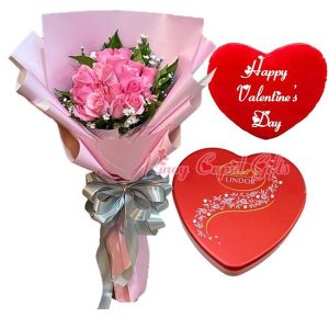 1 dozen pink roses, Lindt Heart Chocolate, & Valentines Heart Pillow