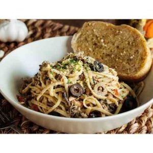 Spanish Sardines in an aglio e olio infusion (garlic and olive oil), topped with tomatoes and mushroom.